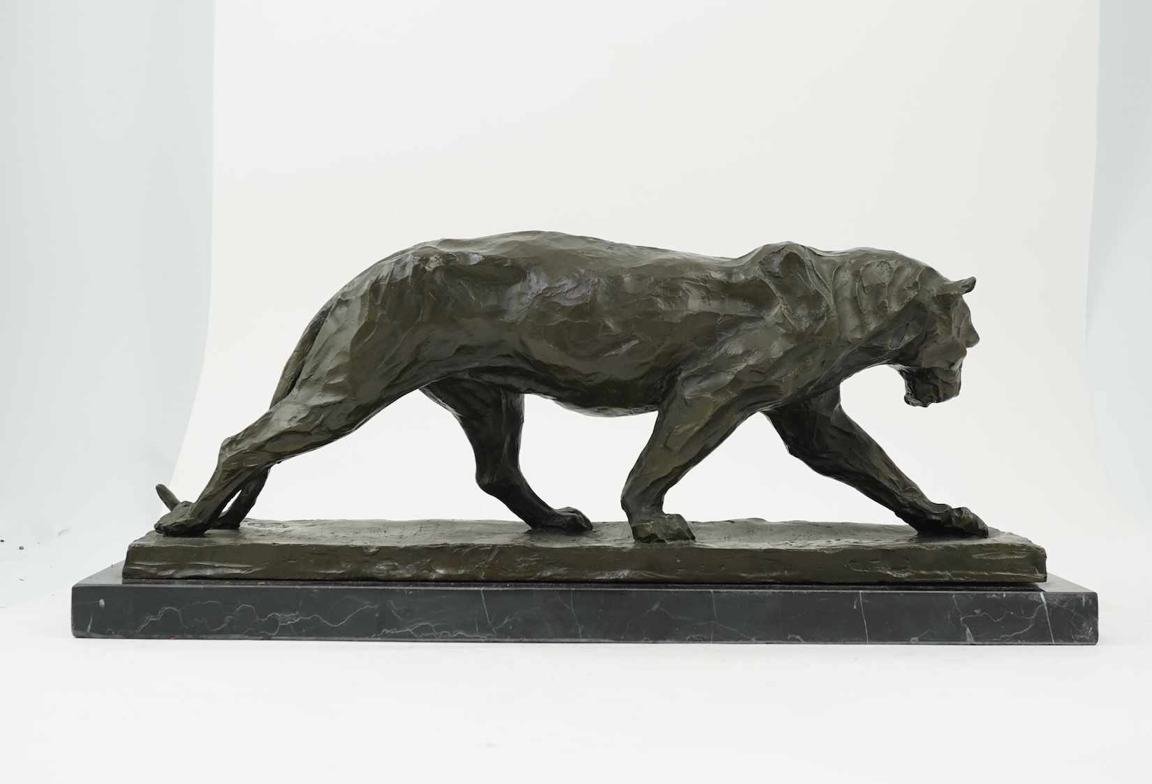 After Rembrandt Bugatti (Italian, 1884-1916): A patinated bronze of a prowling panther